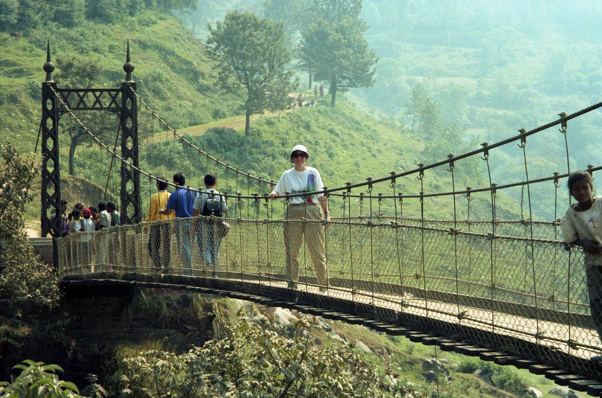 Kathmandu Valley 3 Chobar Gorge 03 Charlotte On Bridge Over Chobar Gorge 1991 Charlotte Ryan poses on the narrow suspension bridge built in Aberdeen, Scotland in 1903 spanning the Chobar Gorge.